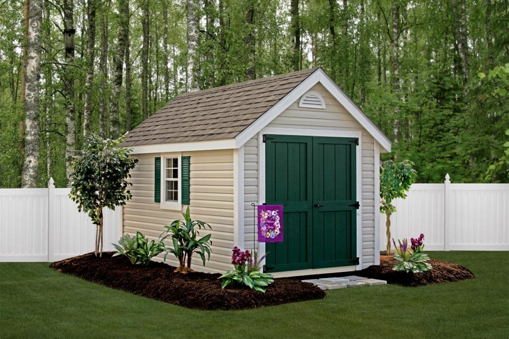Deluxe Classic 8′ x 12′ • Classic Linen vinyl siding, green doors and shutters, white trim, slate architectural shingles