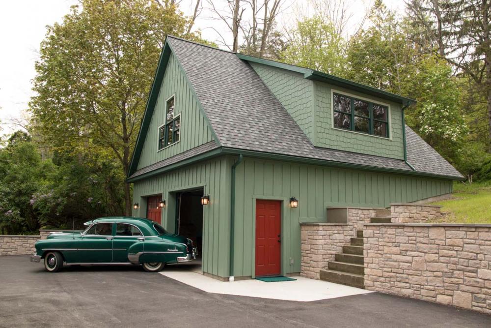 Custom Elite Garage with Hardi Siding and Carriage House Garage Doors