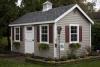 cape cod barn 10' x 16' with sandstone vinyl siding